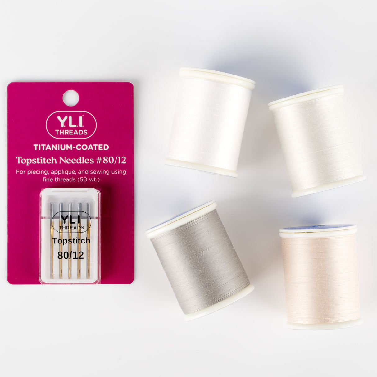 spools of dream seam cotton thread and topstitch needles