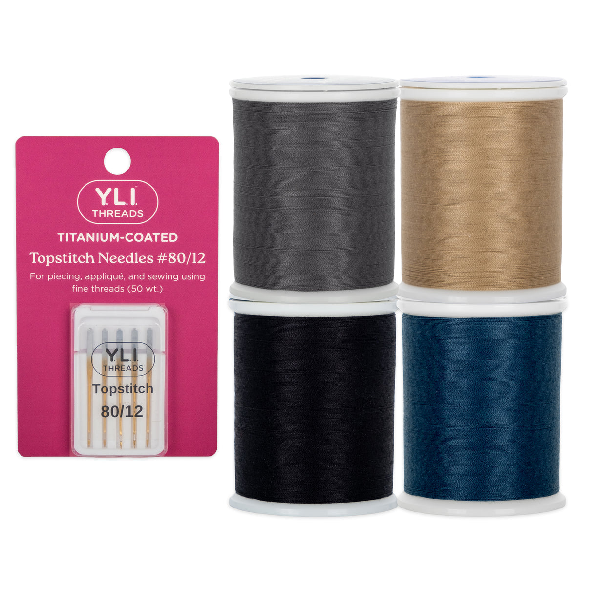 Four spools of dream seam thread in black, gold, grey, and blue with a package of YLI threads on a white background.