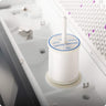 white spool of dream seam cotton thread on home sewing machine
