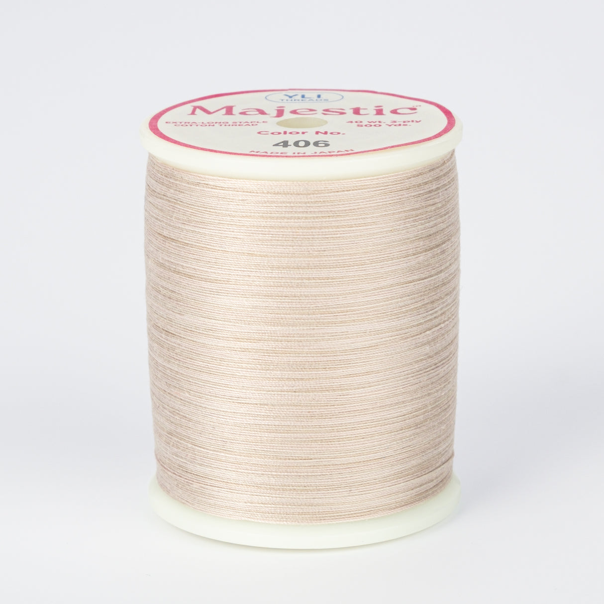 spool of majestic cotton quilting thread #406 abalone