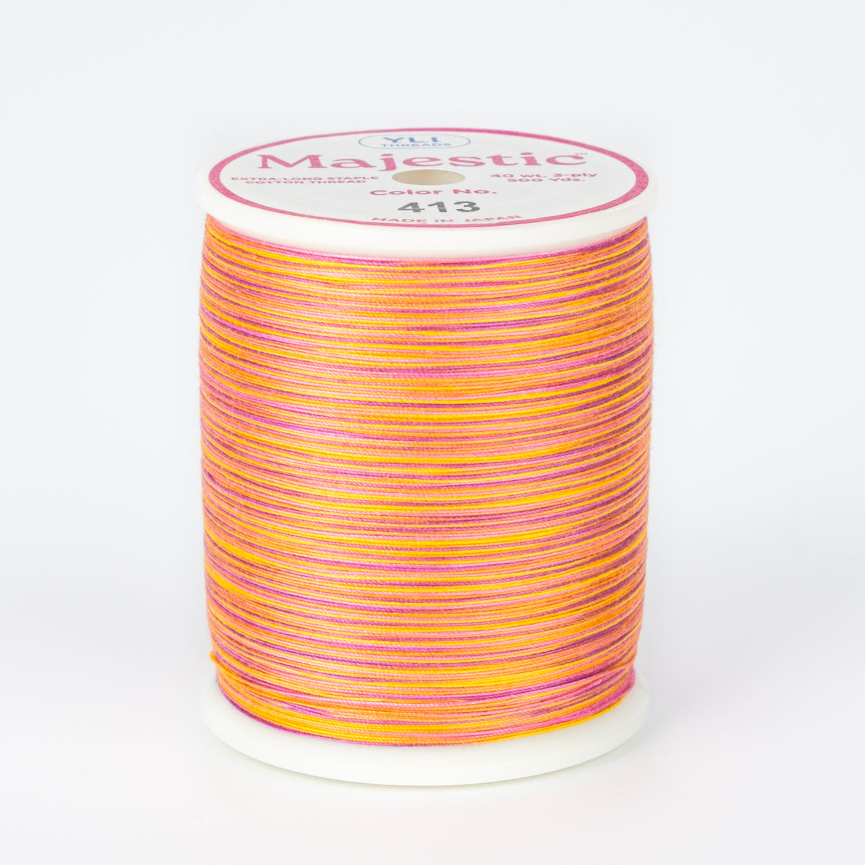 spool of majestic cotton quilting thread #413 tahitian sunset