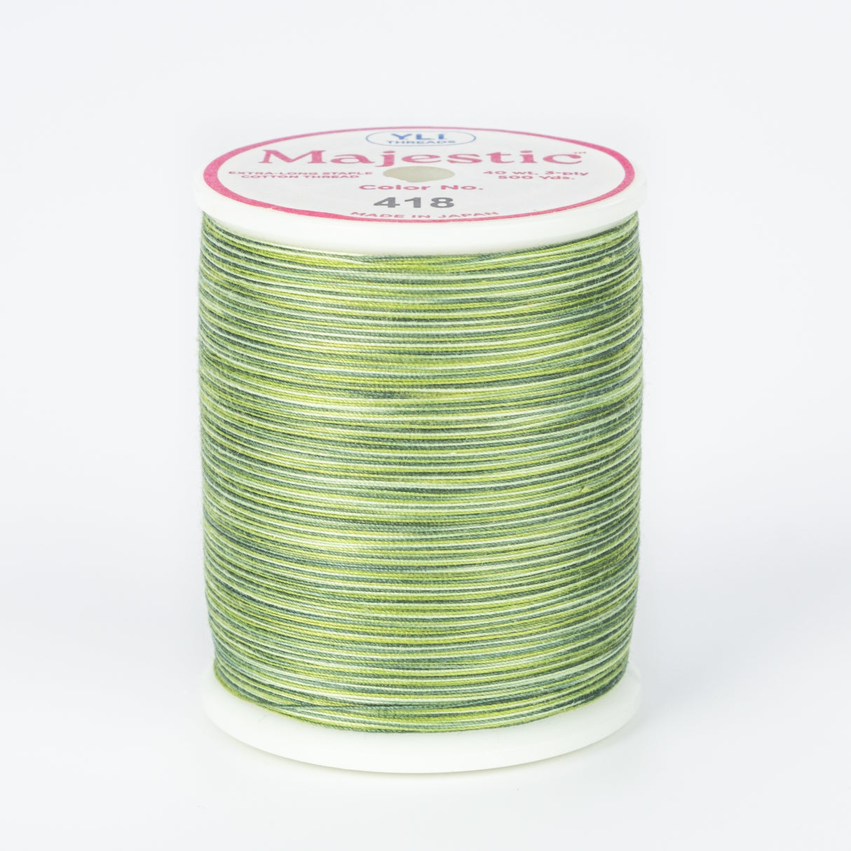 spool of majestic cotton quilting thread #418 palm tree
