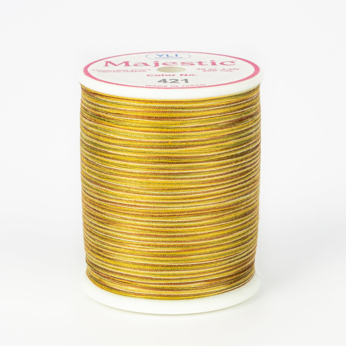 spool of majestic cotton quilting thread #421 tamarisk