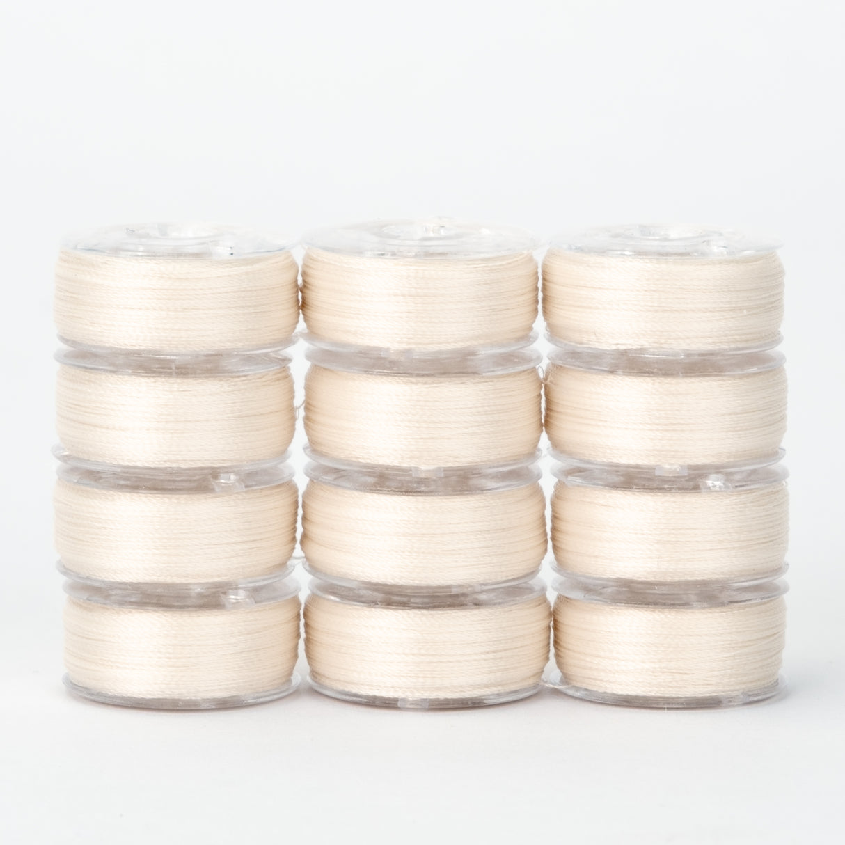 precision polyester thread class 15 prewound bobbins #203 ivory dozen pack