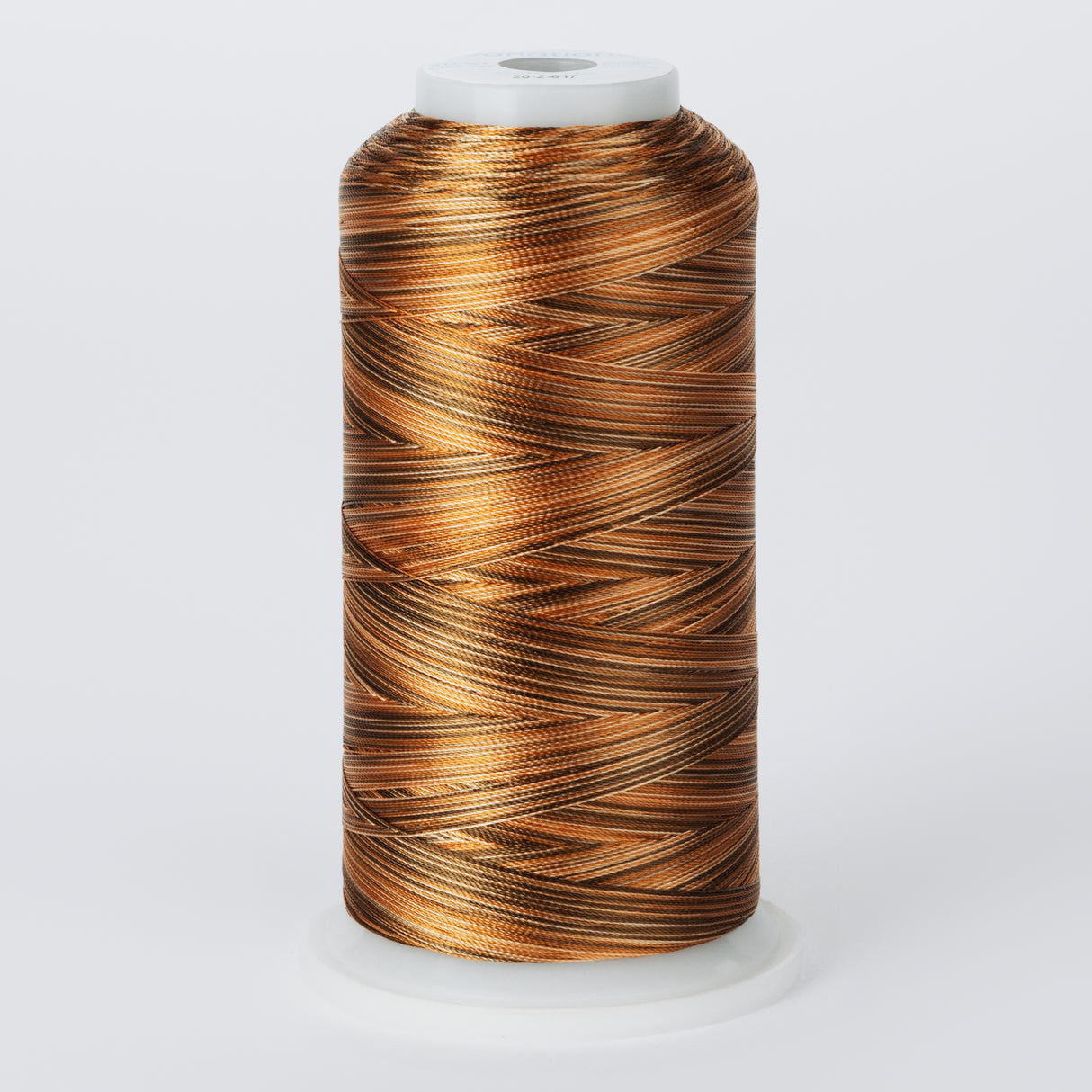 variegated bronze and orange polyester embroidery and quliting thread