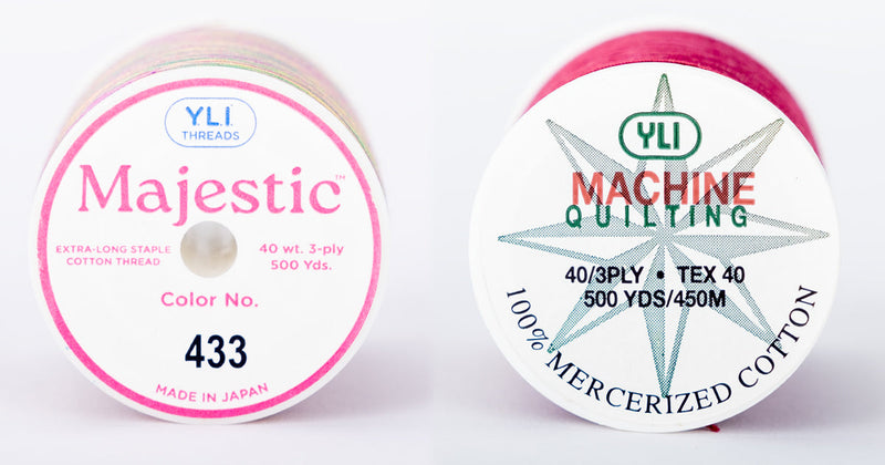 spools of yli threads with labels visible