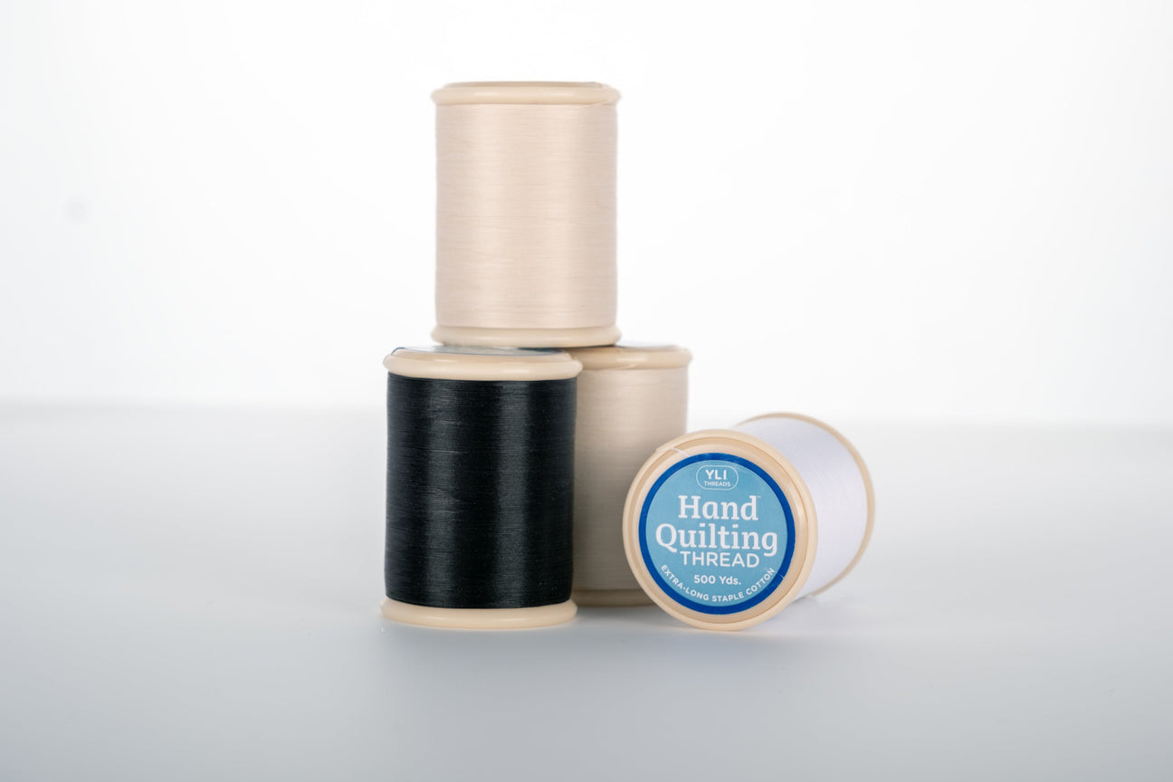 spools of hand quilting thread