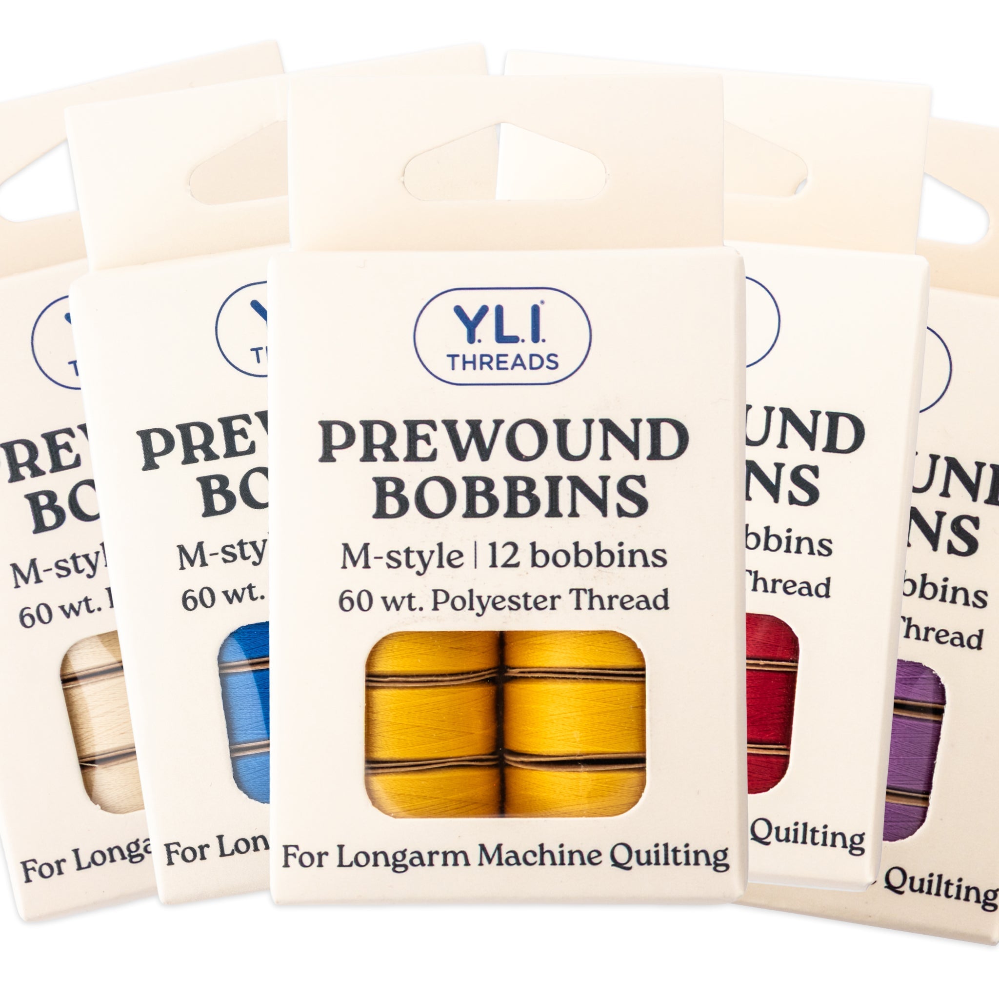 Man Using Packthread M-Style Prewound Bobbins 60 wt. Polyester for Longarm Quilting – YLI ...