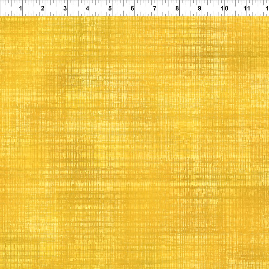 Yellow textured tonal fabric.