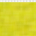 Yellow green textured tonal fabric.