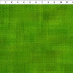 Green textured tonal fabric.