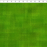 Green textured tonal fabric.