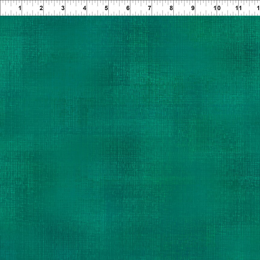 Blue green textured tonal fabric.