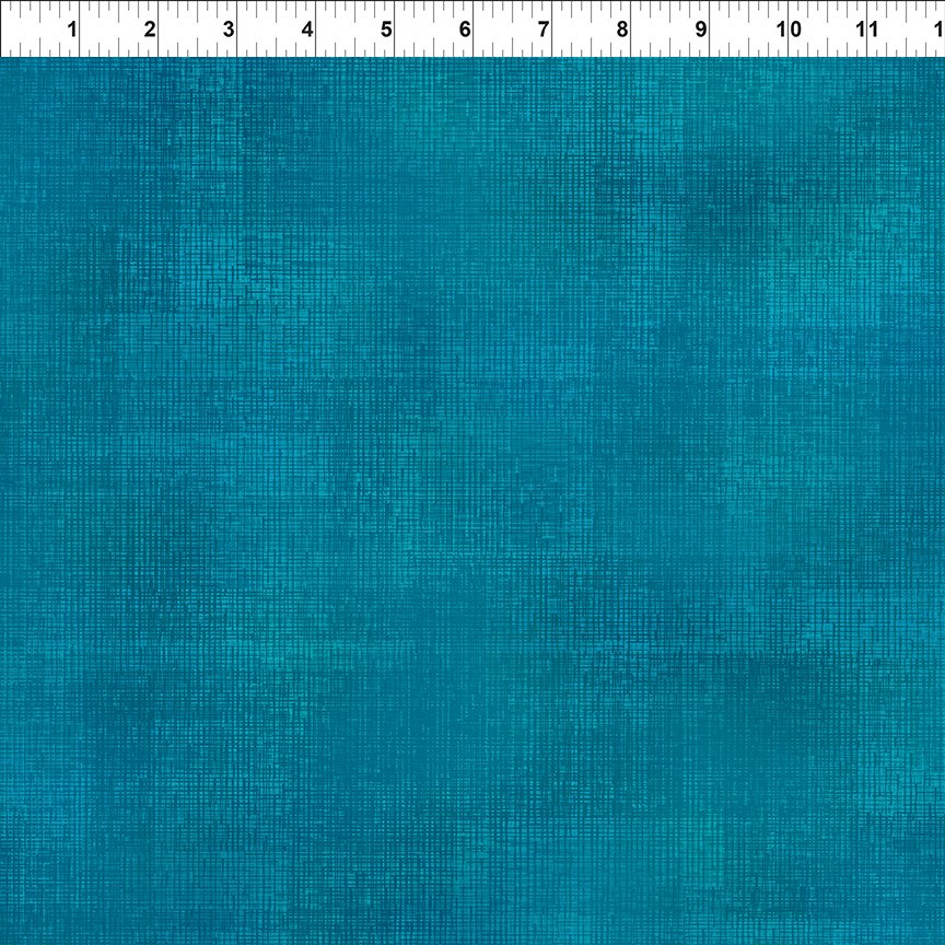 Teal textured tonal fabric.