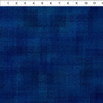 Dark blue textured tonal fabric.