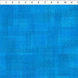 Blue textured tonal fabric.
