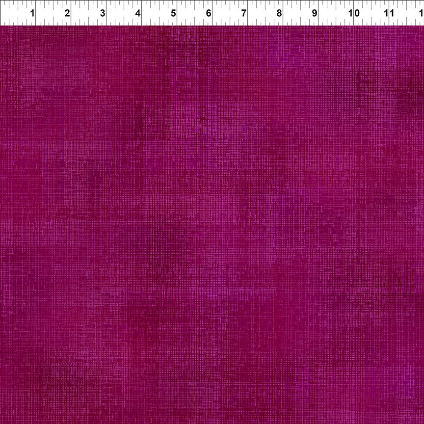 Dark pink textured tonal fabric.