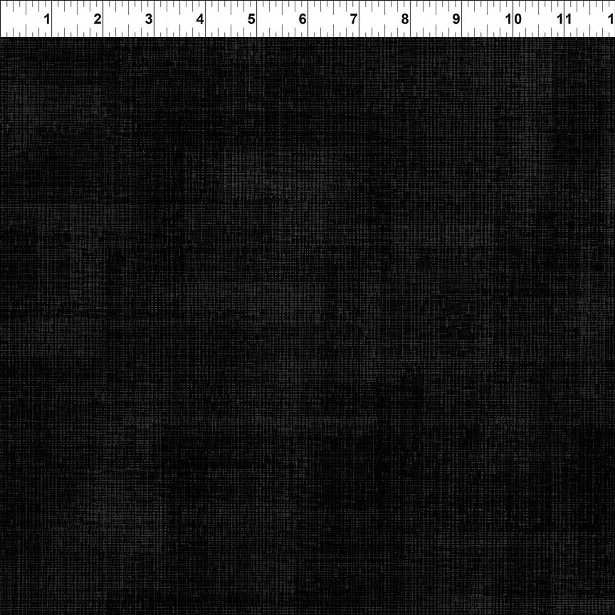 Dark gray black textured tonal fabric.