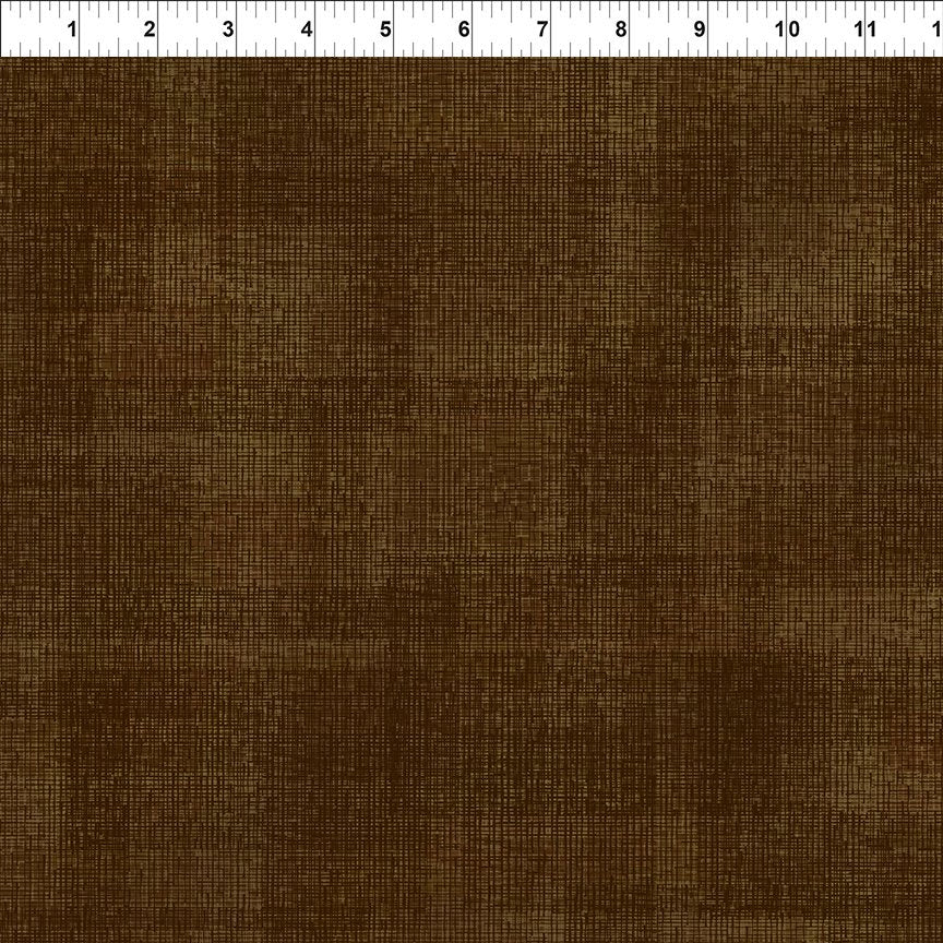 Brown textured tonal fabric.