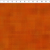 Dark orange textured tonal fabric.