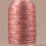 Pink metallic thread on white plastic spool with shimmer finish
