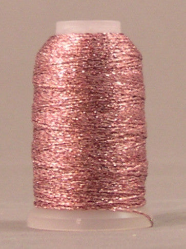 Pink metallic thread on white plastic spool with shimmer finish