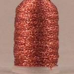 Melon colored metallic thread wound on white spool with shimmery copper-orange finish