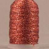 Melon colored metallic thread wound on white spool with shimmery copper-orange finish