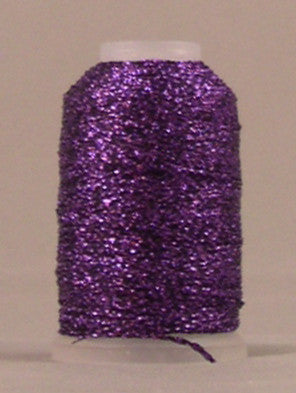 Purple sparkly thread on white spool with metallic finish and visible thread end