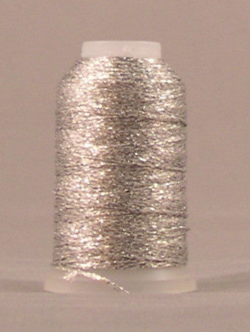 Silver metallic thread wound on white plastic spool with clear packaging label
