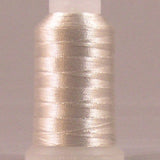 Silver metallic thread on white plastic spool with fine shimmer finish
