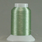 Pale green metallic thread wound on white plastic cone with clear cap