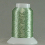 Pale green metallic thread wound on white plastic cone with clear cap