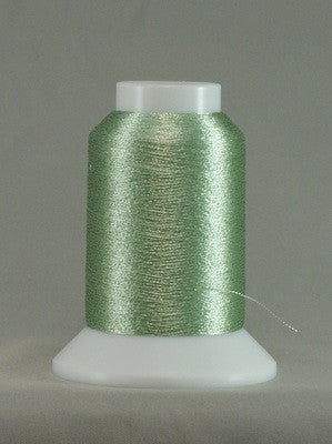 Pale green metallic thread wound on white plastic cone with clear cap