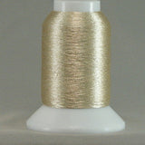 Champagne metallic thread on white cone spool with clear cap
