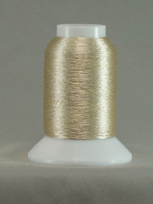 Champagne metallic thread on white cone spool with clear cap