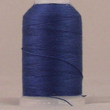 Navy blue 12 weight thread wound on white plastic spool with loose thread end visible