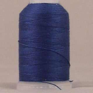 Navy blue 12 weight thread wound on white plastic spool with loose thread end visible