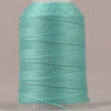 Sea foam green thread wound on white plastic spool with visible thread layers and loose end