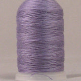 Orchid purple thread wound on white plastic spool with clean, even wrapping