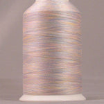 Morning Glory variegated thread on white cone with YLI brand label, showing soft pink, peach and gray multicolored strands
