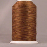 Brown thread wound on white plastic cone spool against neutral background