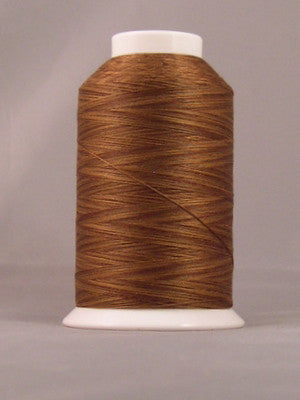 Brown thread wound on white plastic cone spool against neutral background