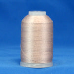 Light taupe thread wound on mini cone spool with white plastic top and clear base against blue background
