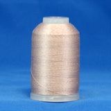 Light taupe thread wound on mini cone spool with white plastic top and clear base against blue background