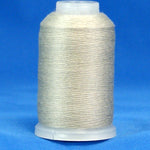 Gray thread wound on white plastic cone against blue background