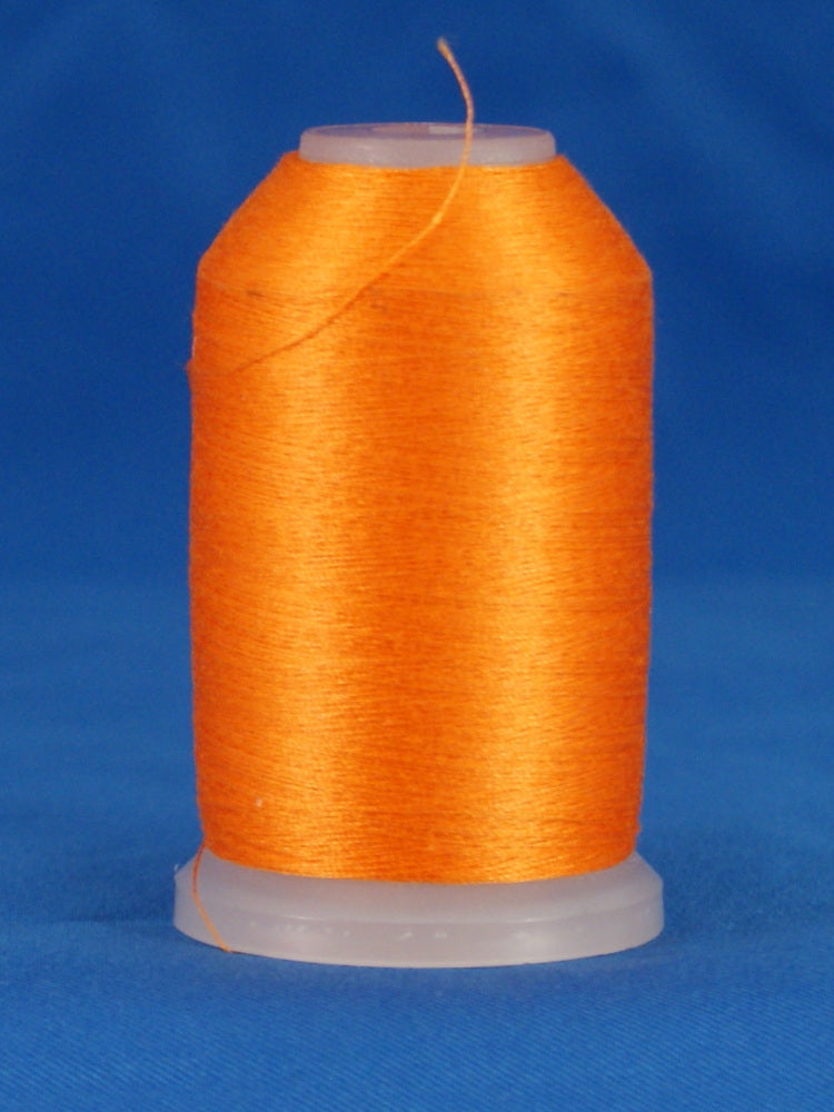 Orange thread wound on white plastic cone spool against blue background