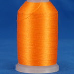 Orange thread wound on white plastic cone spool against blue background