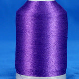 Purple embroidery thread wound on white plastic cone with tapered shape against blue background