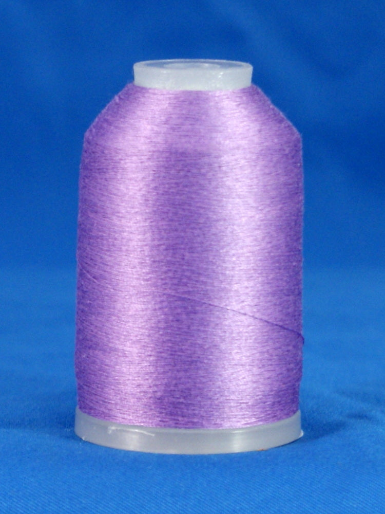 Lavender purple thread wound on clear plastic cone against blue background
